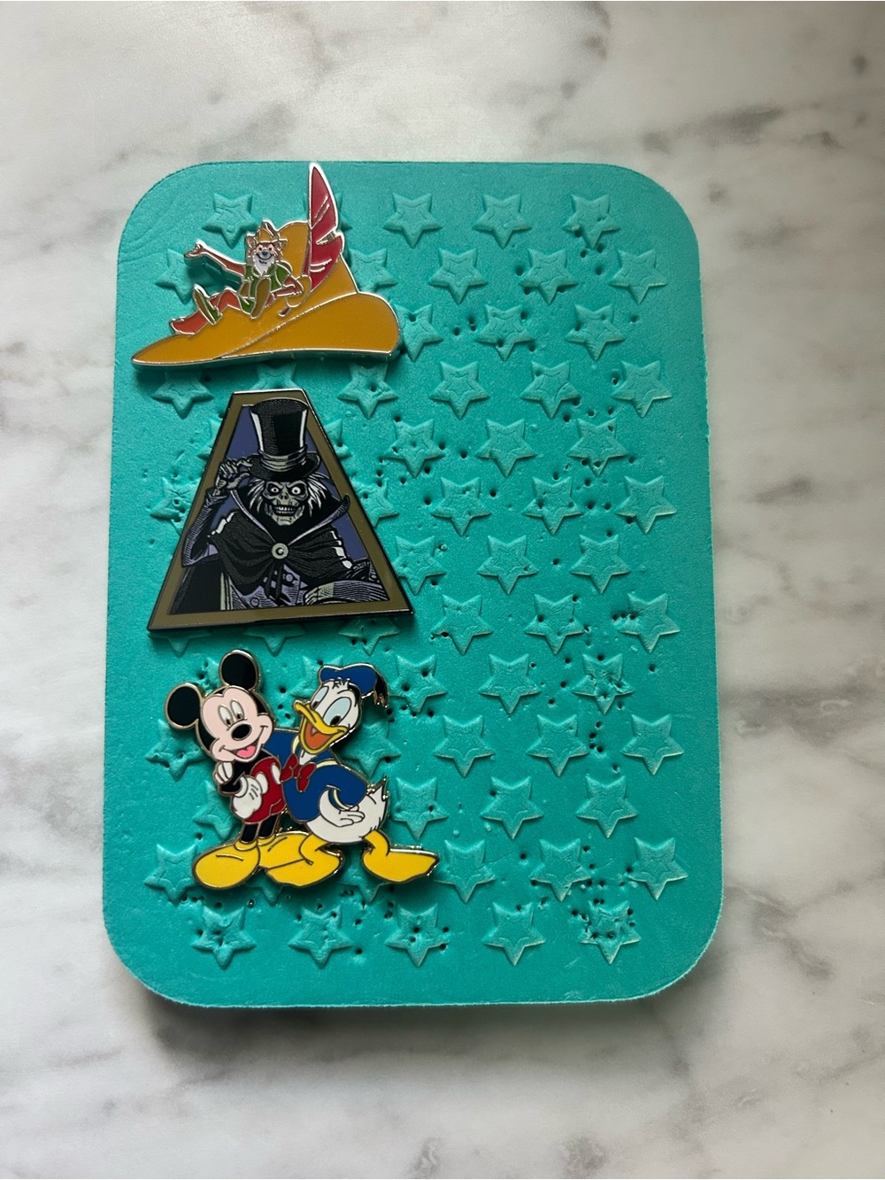 Disney Teal Star Pin Display with Mickey, Donald Robin Hood & Hat Box Ghost